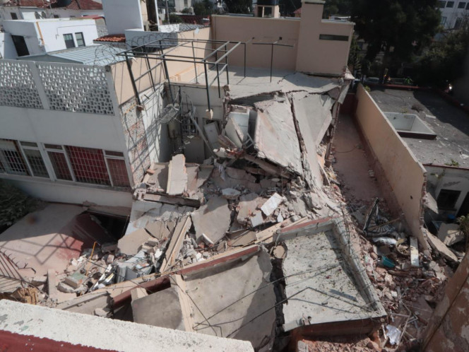 Anuncian demolición de dos casas por la explosión en la Del Valle, ante riesgo de colapso total. / Foto: Cuartoscuro Anuncian demolición de dos casas por la explosión en la Del Valle, ante riesgo de colapso total