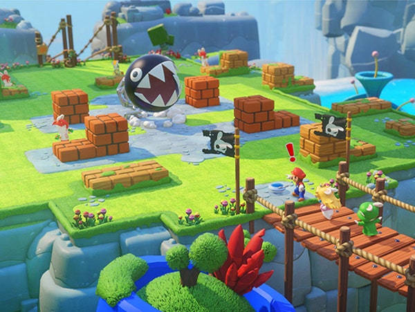 Captura de pantalla de Rabbids Kingdom Battle con los personajes cruzando un puente.